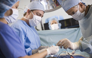 Clinician using hypnosis with a surgical patient